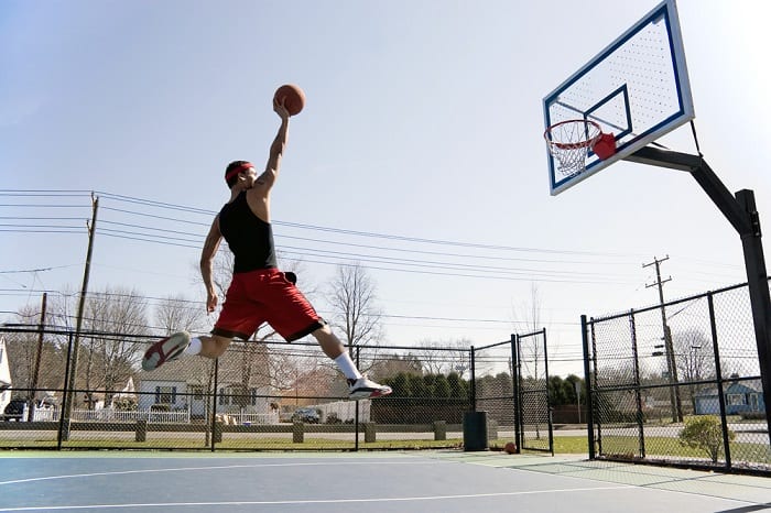 Man Dunking the Basketball