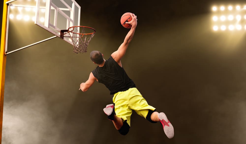 Basketball player makes shoot in jump