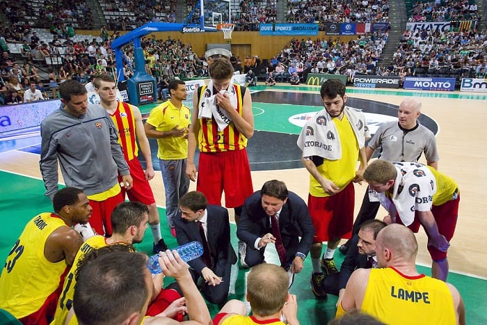 A basketball team during timeout