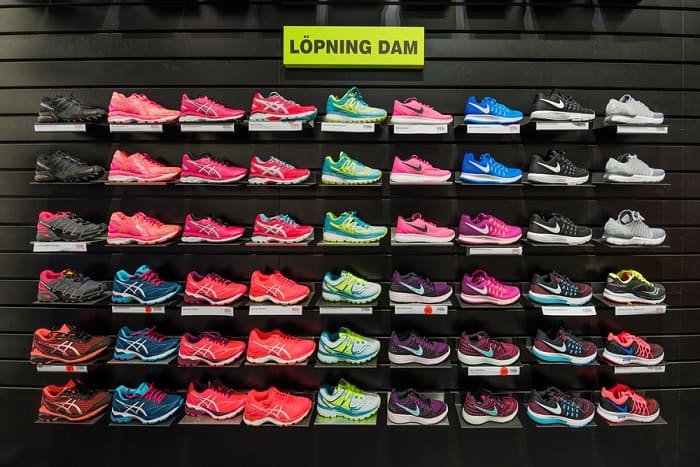 Various models and brands of running shoes for ladies in Stadium store in a Shopping Center.