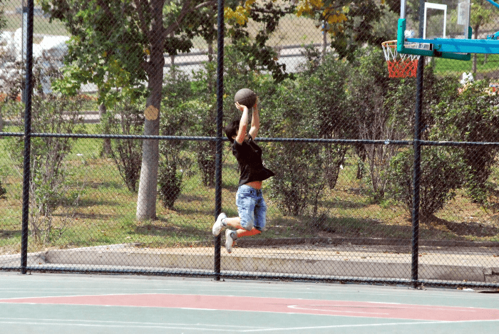 basketball player jumping during a shoot