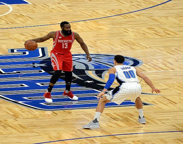 James Harden with basketball in basketball court