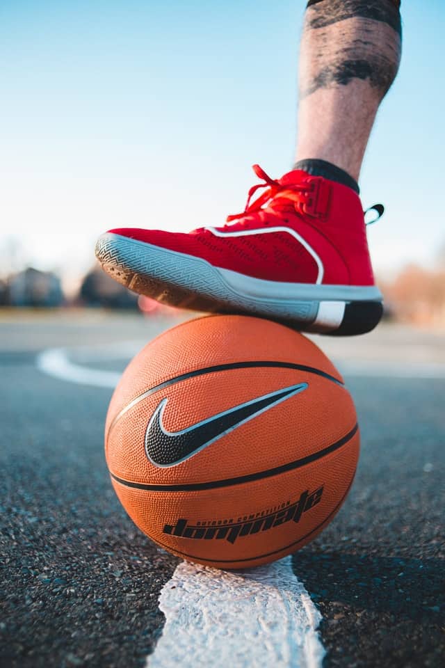 player with basketball shoe and basketball