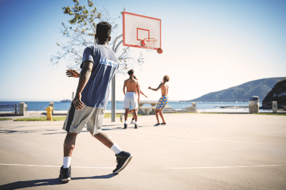 playing basketball outdoors
